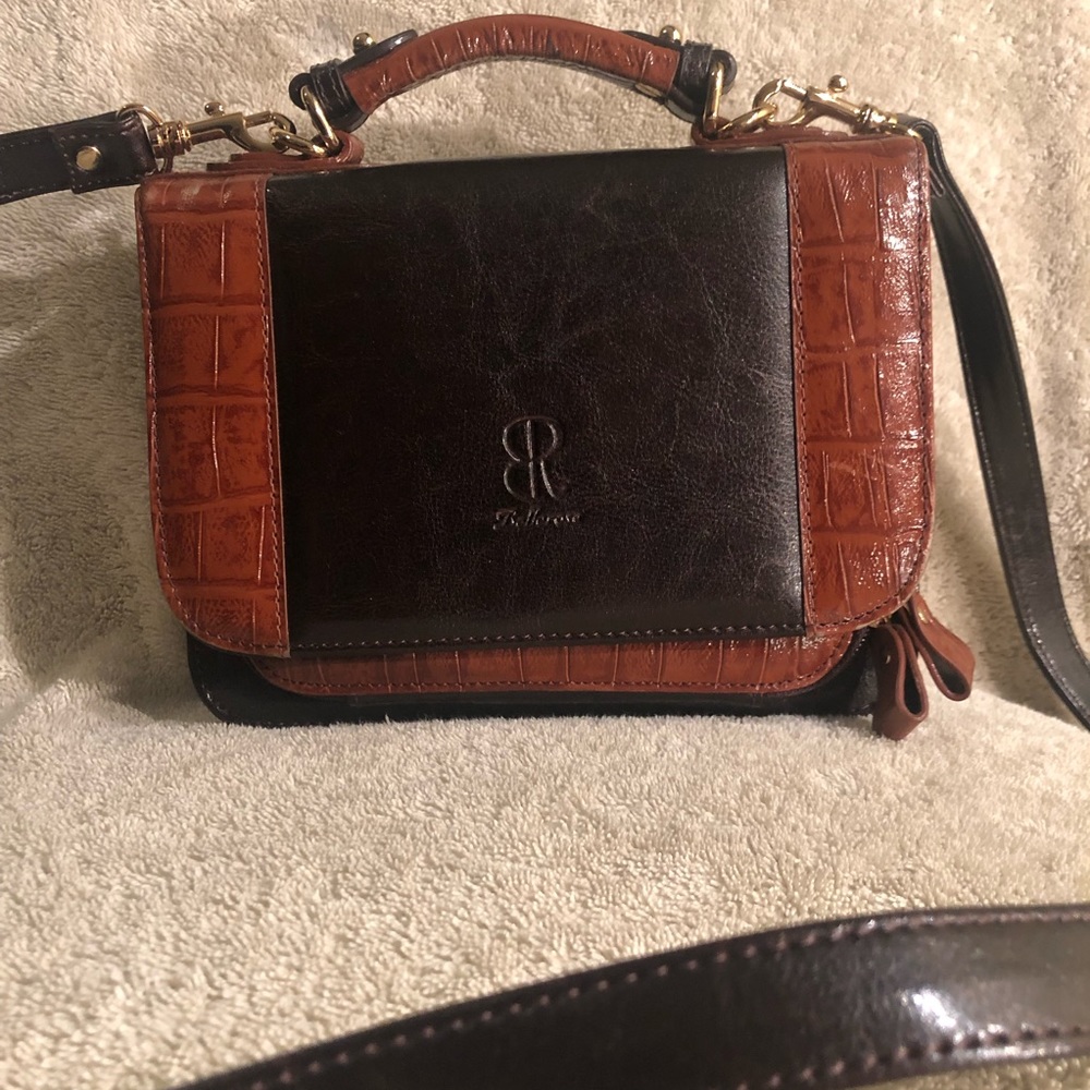 Selling a super cute bag with lots of compartments